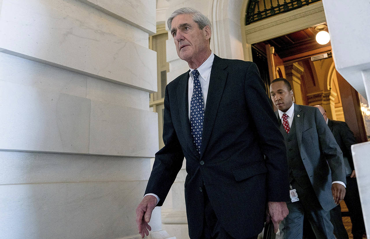 In this June 2017 photo, former FBI Director Robert Mueller, the special counsel probing Russian interference in the 2016 election, departs Capitol Hill in Washington. (AP Photo/Andrew Harnik, File)