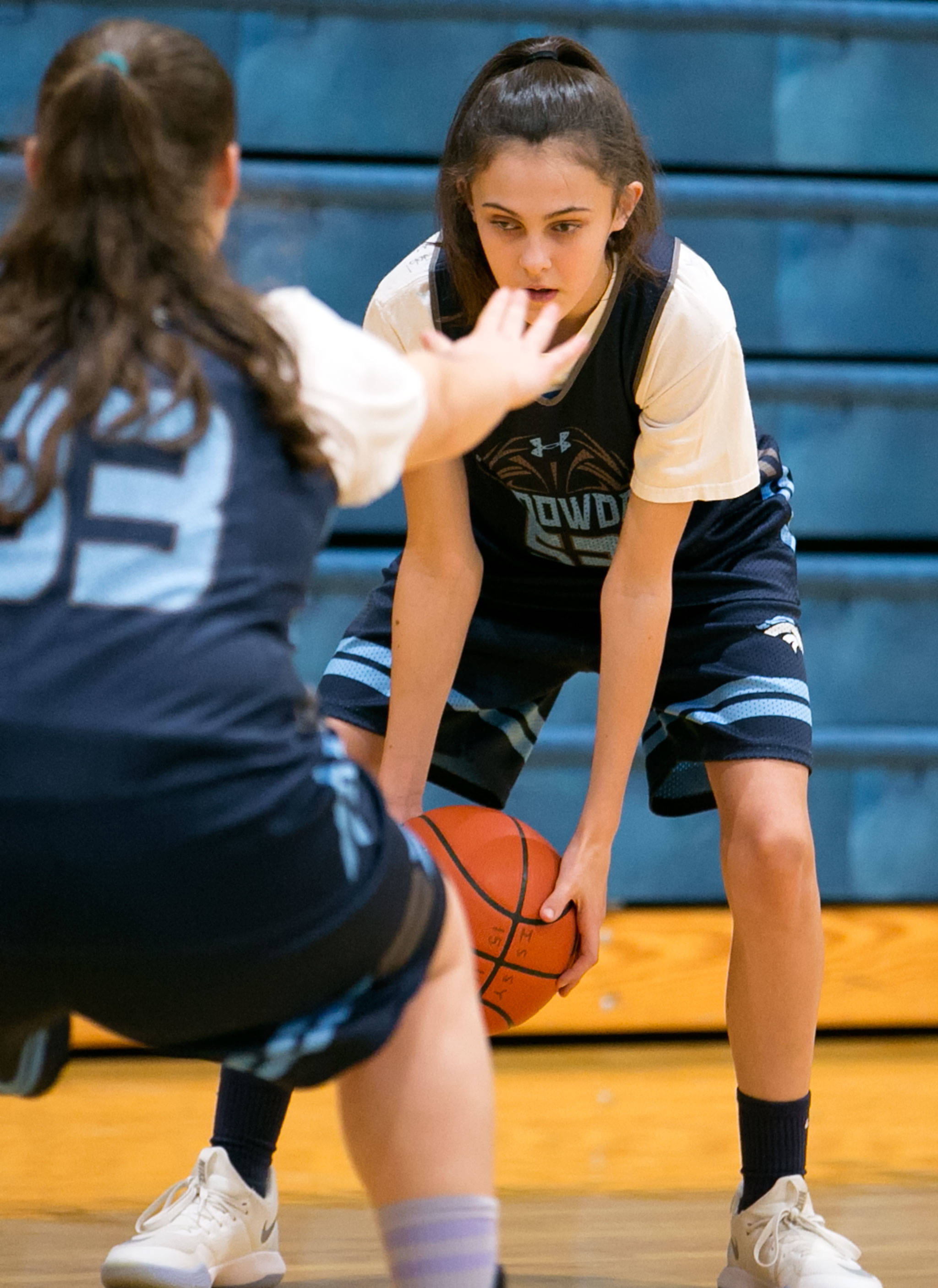 Meadowdale freshman Kayley Kesselring (rear) is guarded by Karina Gorbatyuk during practice on Jan. 11, 2018, at Meadowdale High School in Lynnwood. (Kevin Clark / The Herald)