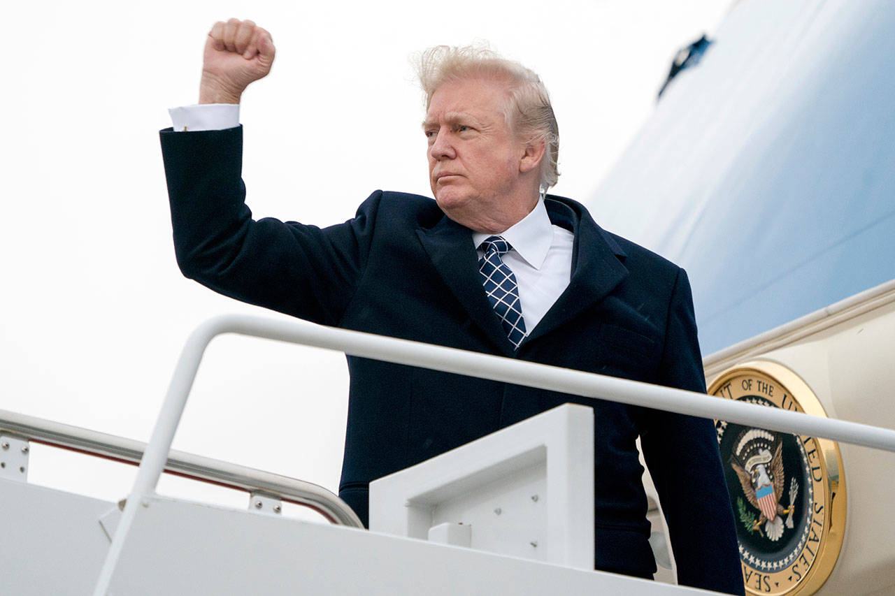 President Donald Trump, seen here as he boards Air Force One at Andrews Air Force Base, Md., Friday, Jan. 12, 2018, to travel to Palm Beach International Airport in West Palm Beach, Fla., said a program to protect immigrants brought to the U.S. illegally as children is “probably dead” Sunday. (AP Photo/Andrew Harnik. (AP Photo/Andrew Harnik)