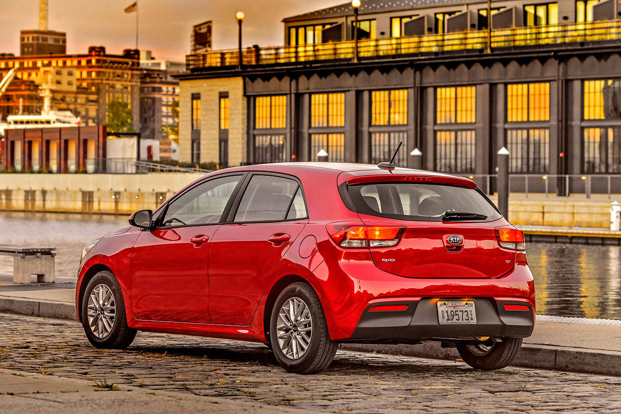 The Kia Rio 5-Door hatchback has fold-down rear seats and a rear cargo area with an integrated cover that conceals items from outside view. (Manufacturer photo)