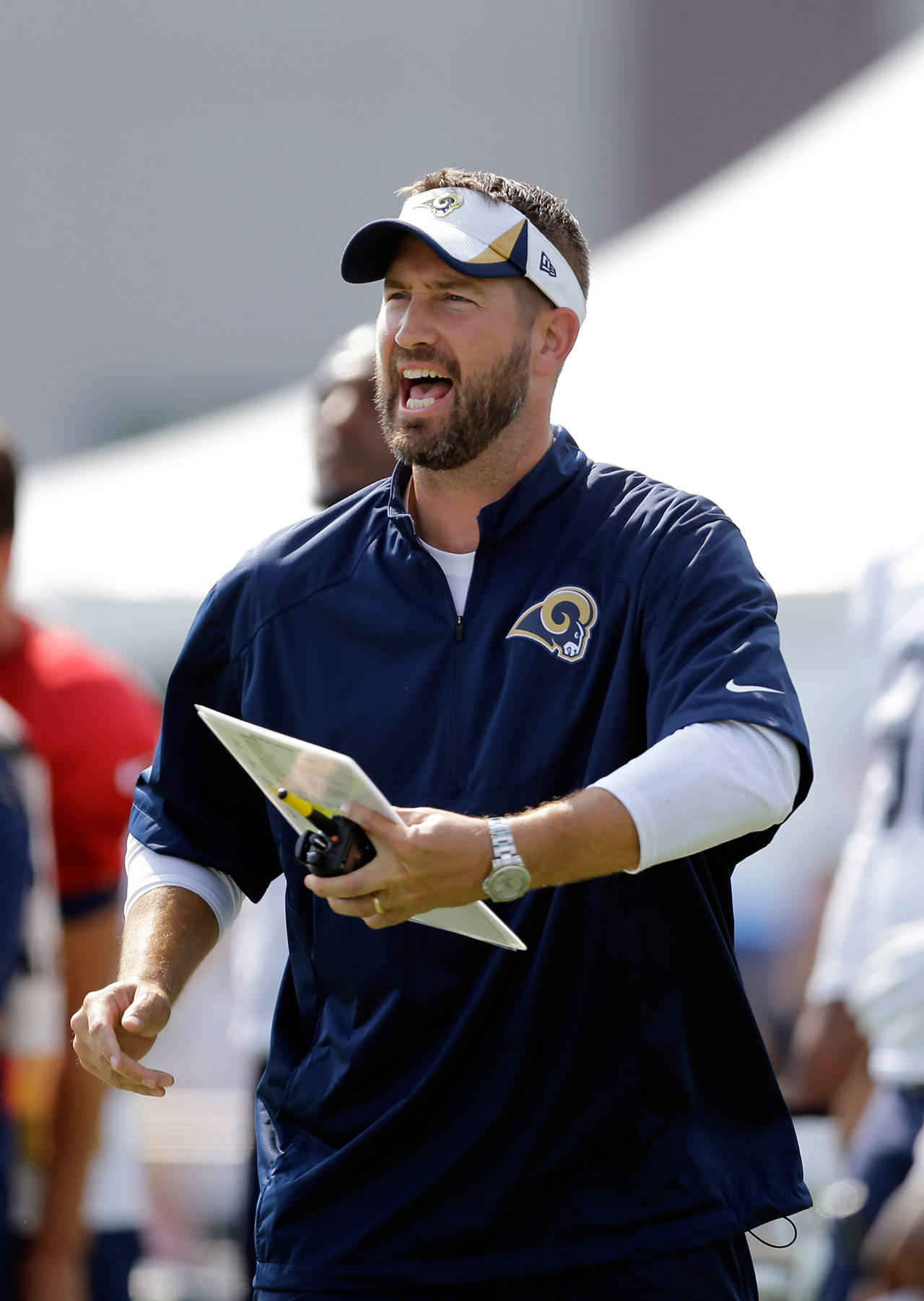 Former Rams offensive coordinator Brian Schottenheimer yells during training camp practice on July 29, 2014, in St. Louis. (AP Photo/Jeff Roberson)