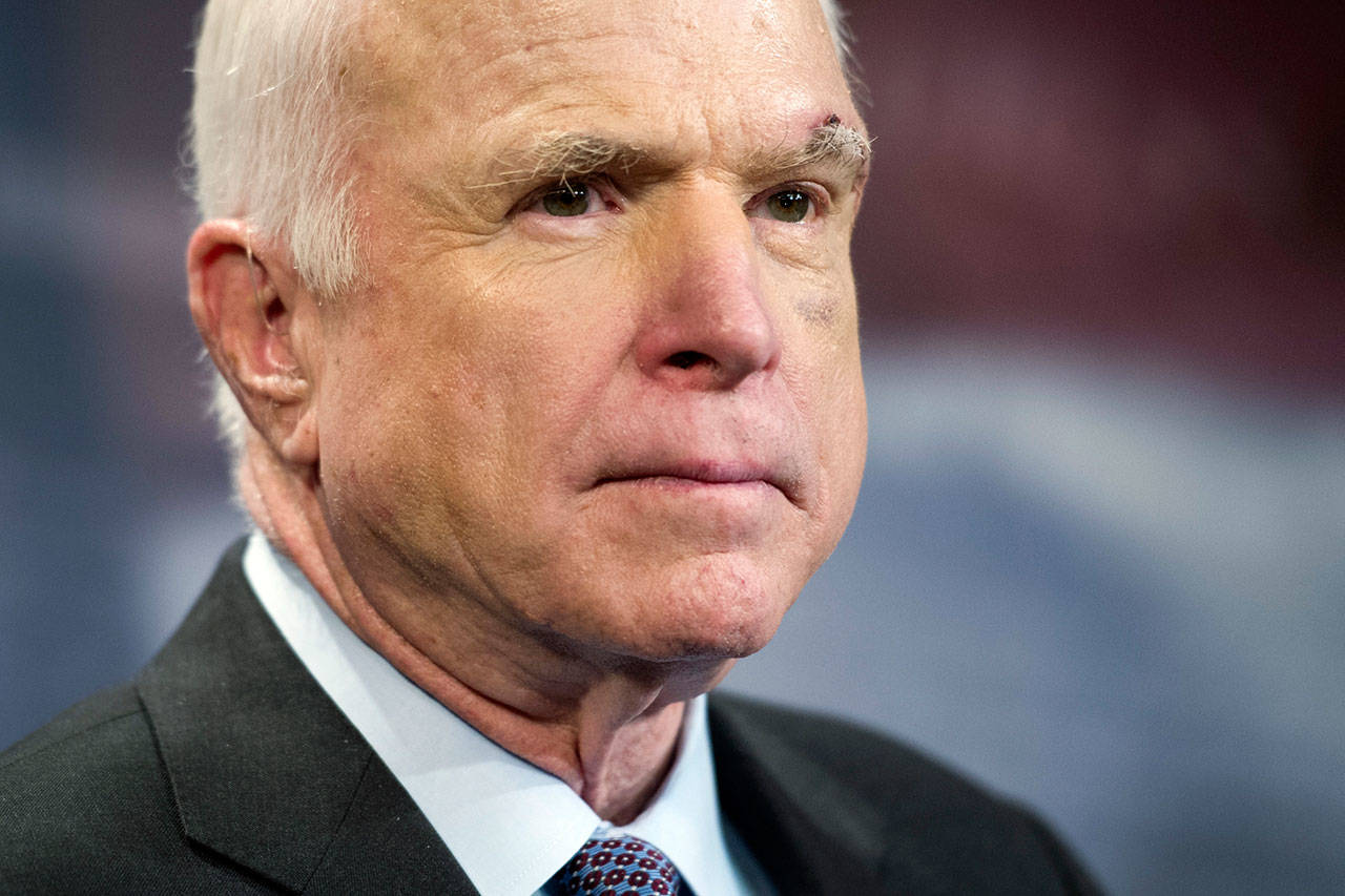 Sen. John McCain, R-Arizona, speaks to reporters on Capitol Hill in Washington in July. (Cliff Owen / Associated Press file photo)