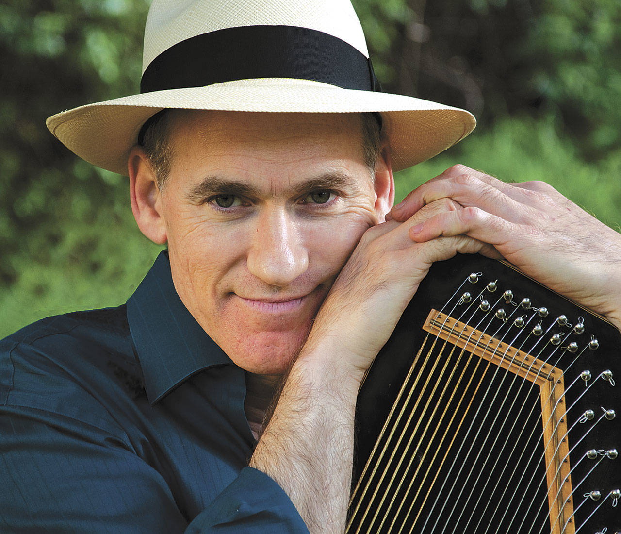 Autoharpist Adam Miller will perform a concert Jan. 21 at the Everett Public Library. (Bonnie Hawthorne)