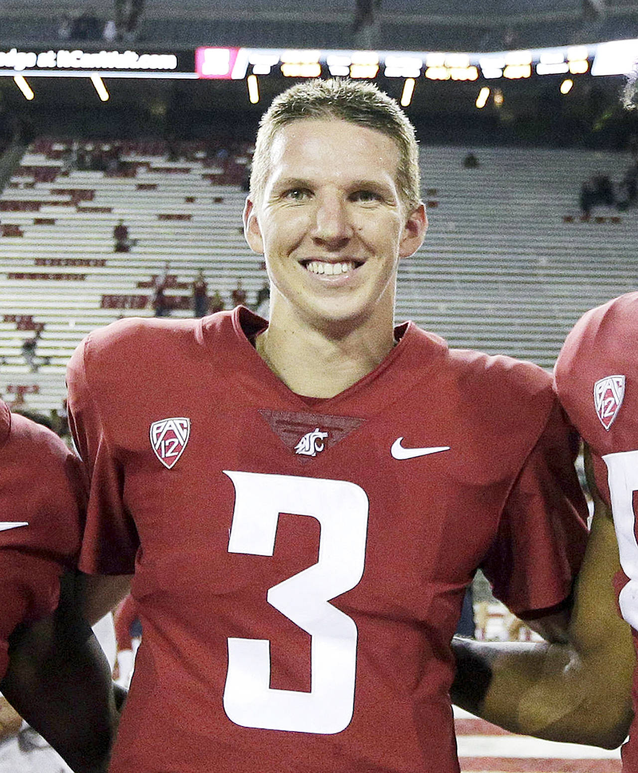 Washington State quarterback Tyler Hilinski, 21, poses for a photo after an NCAA college football game against Boise State in Pullman on Sept. 9. Hilinski died from an apparent self-inflicted gunshot wound. Hilinski was discovered in his apartment after he didn’t show up for practice Tuesday. (Young Kwak / Associated Press file)