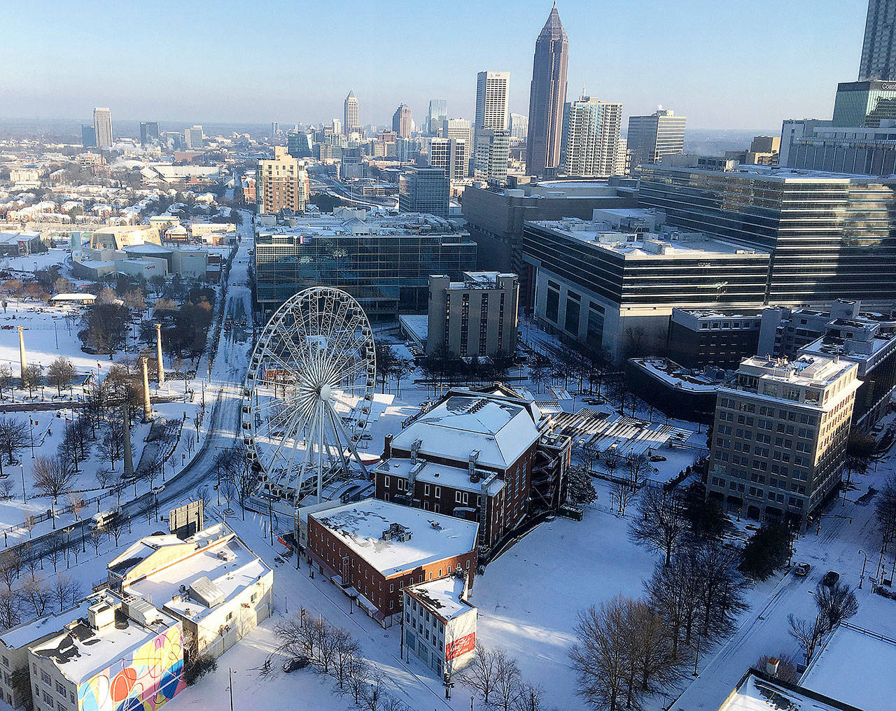 A snow covered downtown is seen Wednesday in Atlanta. (AP Photo/Janelle Cogan)