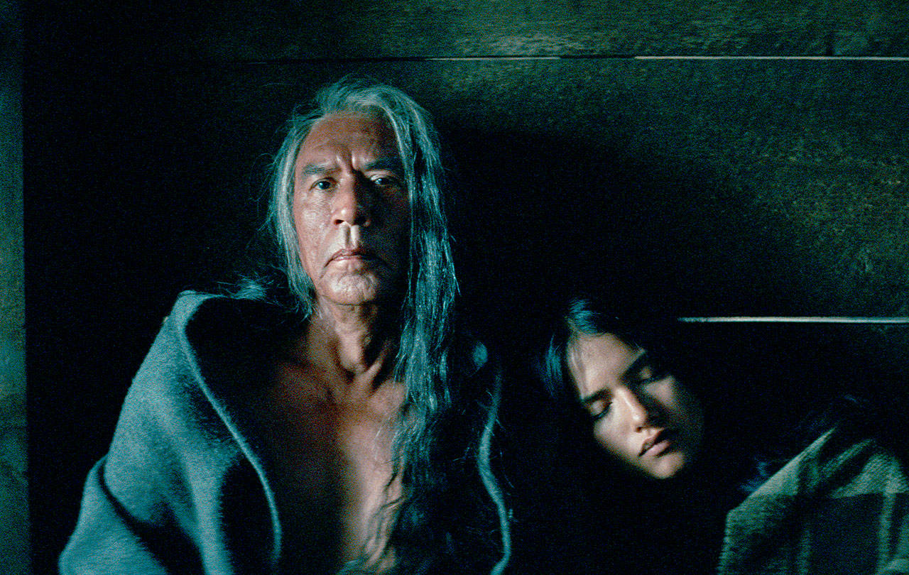 Wes Studi (left) plays a Cheyenne chief who is escorted through dangerous territory with his family by a legendary Army captain, played by Christian Bale, in “Hostiles.” (Entertainment Studios Motion Pictures via AP)