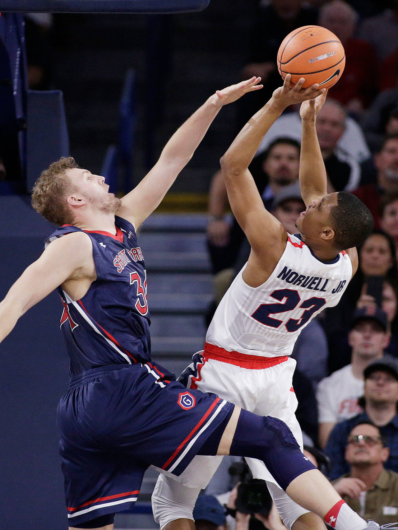 Gonzaga guard Zach Norvell Jr. (23) shoots against Saint Mary’s center Jock Landale during the first half of a game Jan. 18, 2018, in Spokane. (AP Photo/Young Kwak)