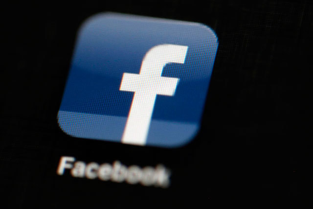 The Facebook logo on an iPad. (AP Photo/Matt Rourke, File)