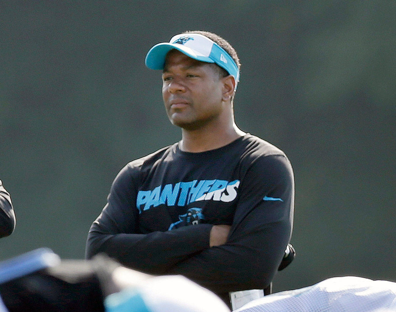 Carolina Panthers assistant head coach Steve Wilks watches players warm up during the NFL football team’s training camp in August in Spartanburg, South Carolina. Wilks has been hired as the head coach of the Arizona Cardinals. (AP Photo/Chuck Burton, File)