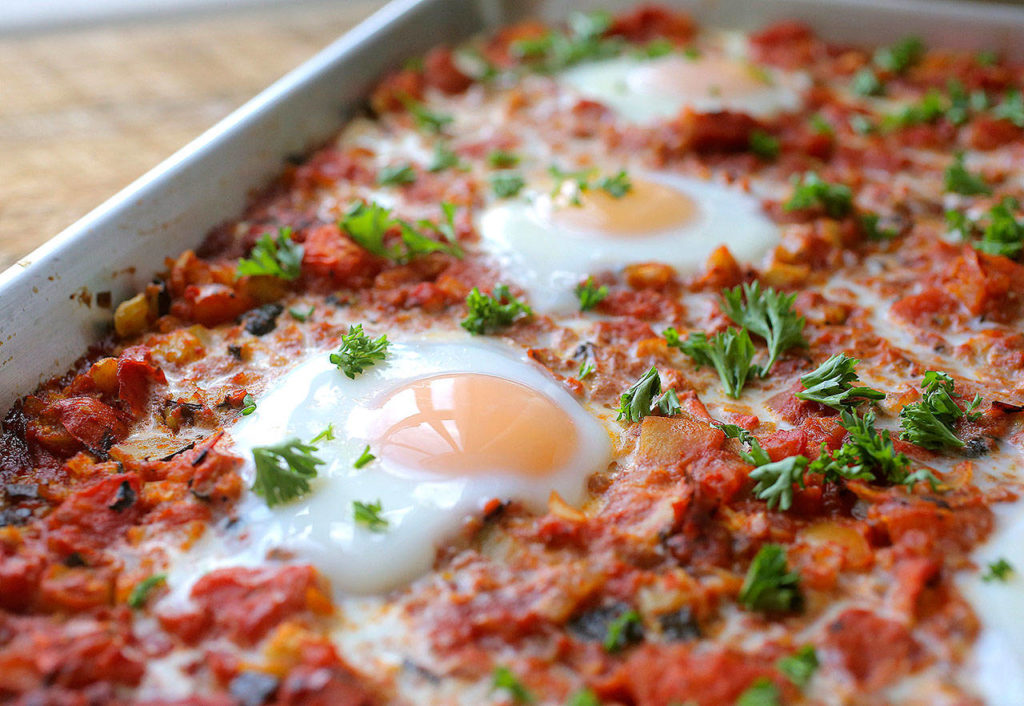 Shakshuka is a Middle-Eastern specialty that is even trendier than sheet-pan meals. (Cristina M. Fletes/St. Louis Post-Dispatch)
