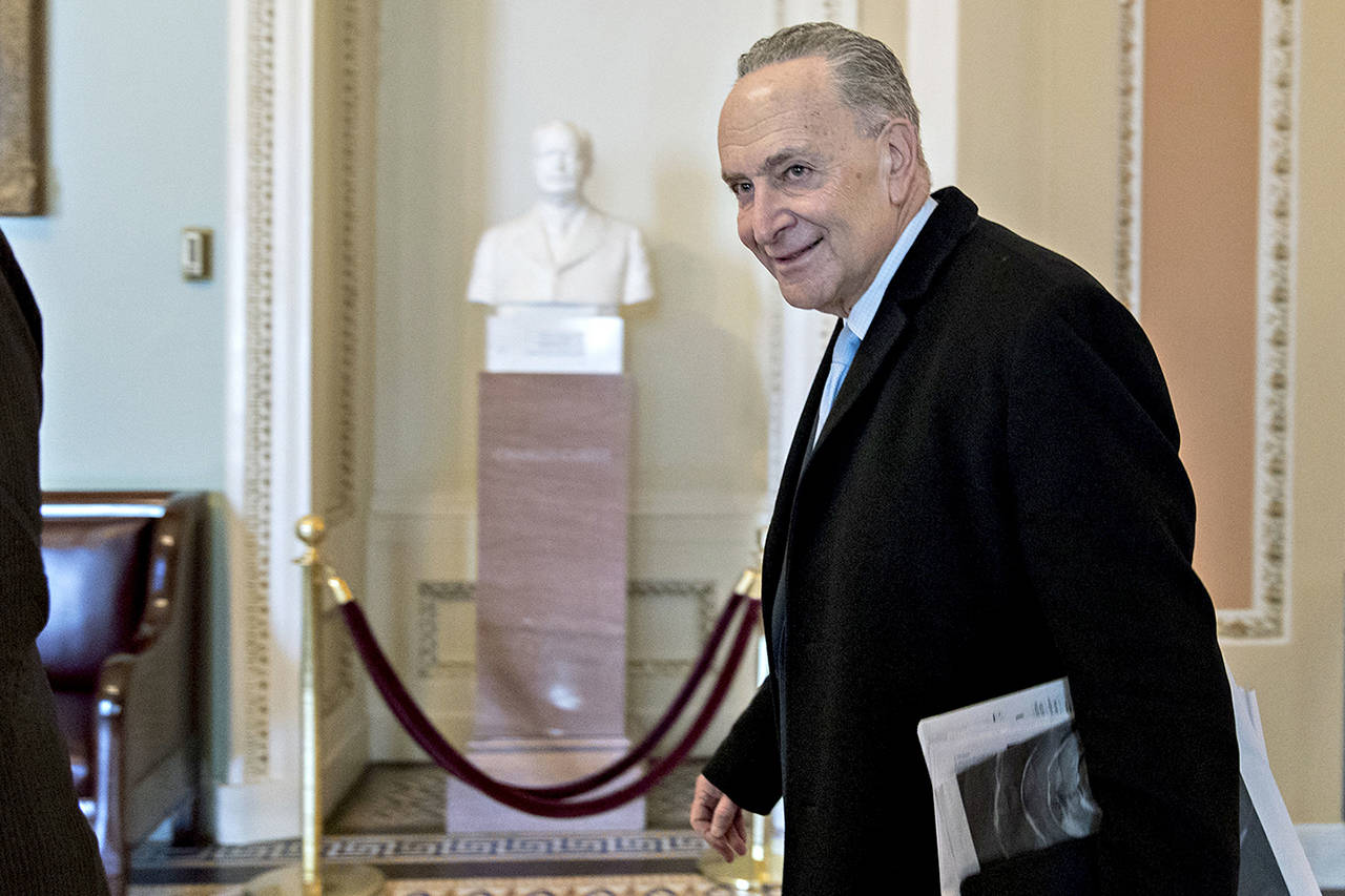 Senate Minority Leader Chuck Schumer, D-N.Y., walks to his office at the U.S. Capitol in Washington on Monday. (Andrew Harrer/Bloomberg)