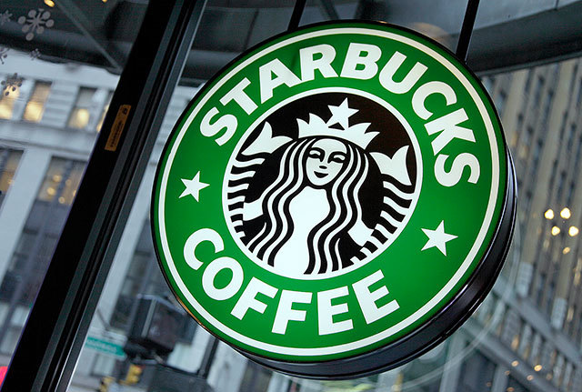 The sign at a Starbucks store in New York. (AP Photo/Richard Drew, File)