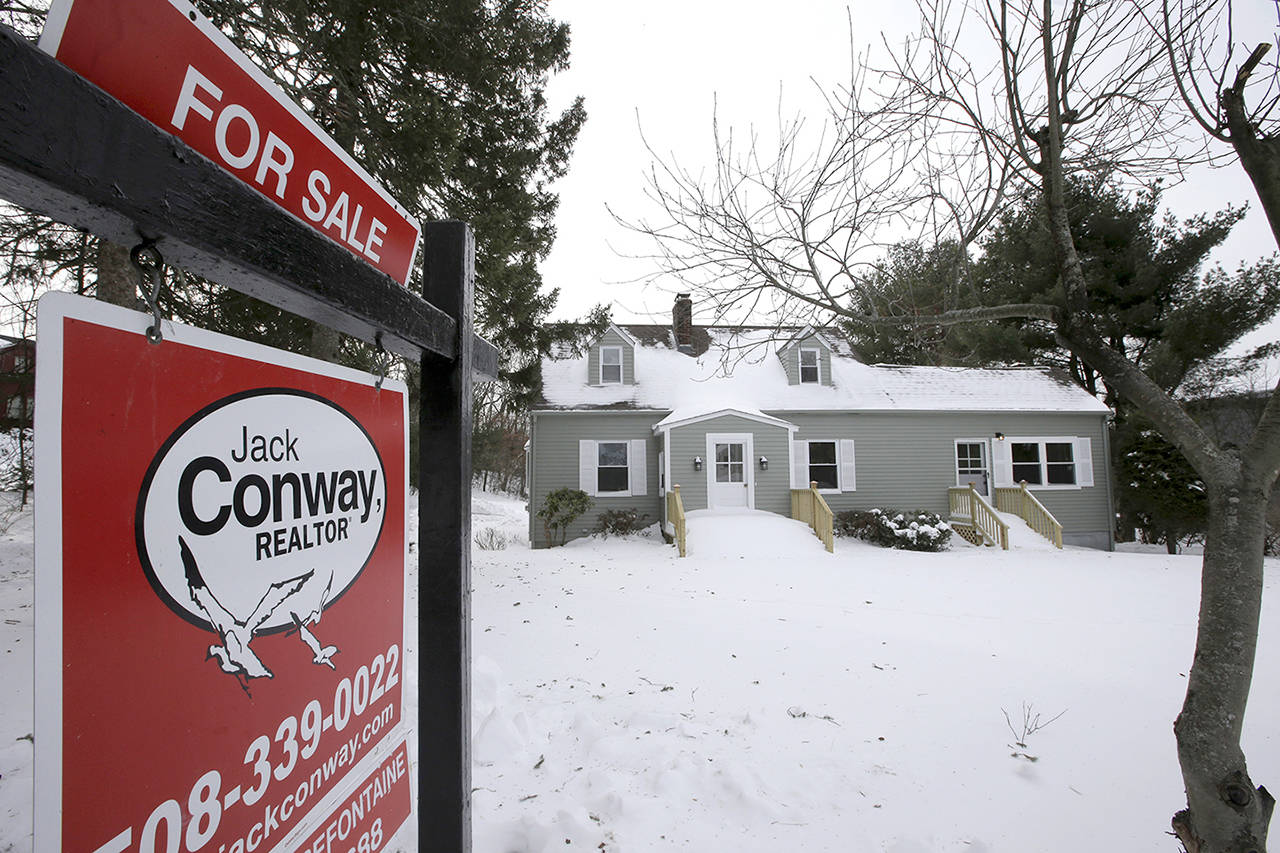 This Jan. 8 photo shows an existing home for sale in Walpole, Massachusetts. (AP Photo/Steven Senne)