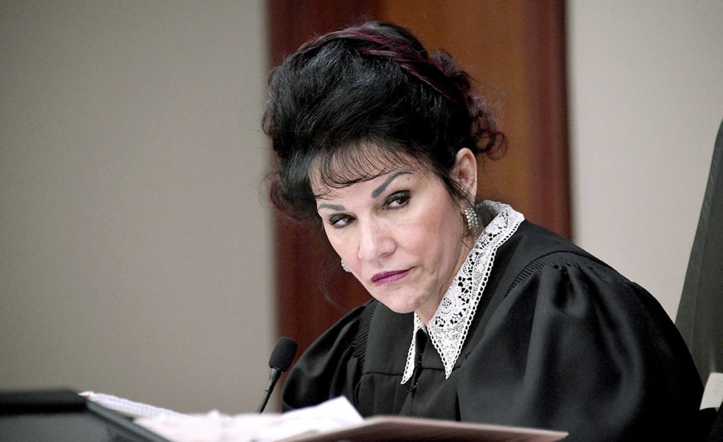 Judge Rosemarie Aquilina listens to Abigayle Bergeron’s victim statement during the sixth day of Larry Nassar’s sentencing hearing Tuesday in Lansing, Michigan. (Dale G. Young/Detroit News via AP)

