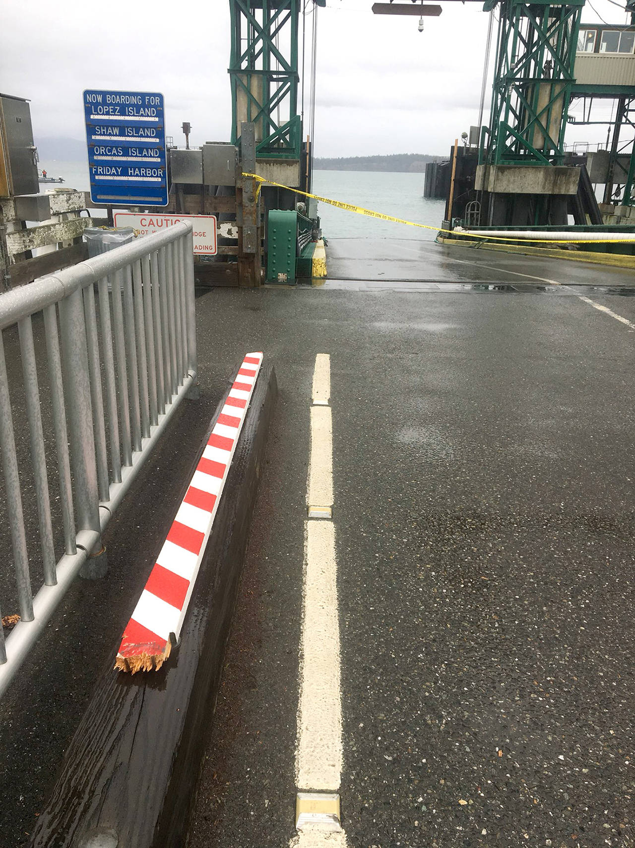 A Cherokee Jeep broke through the crossing arms before driving off the ferry dock and into the water in Anacortes. (Washington State Patrol)