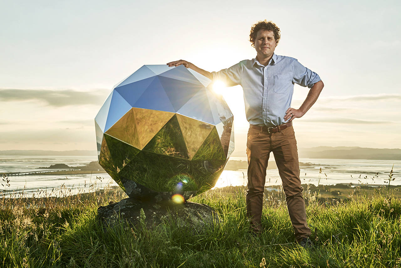 In this Nov. 2017 photo, Rocket Lab founder and CEO Peter Beck is pictured with his “Humanity Star” in Auckland, New Zealand. (Rocket Lab via AP)