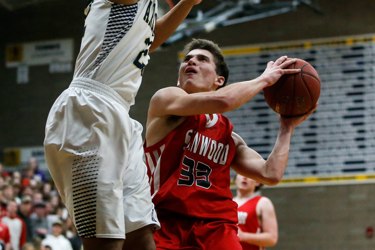 Stanwood boys rout Arlington 71-46 in rivalry game