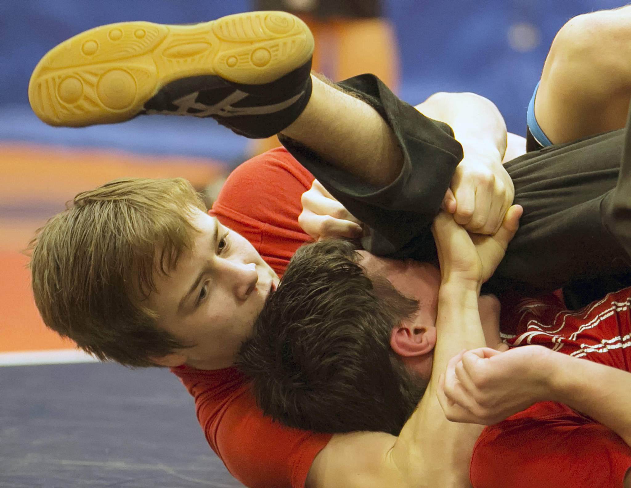 Chad Pease locks Josh Maggard during practice at Sky Valley Education Center in Monroe on Jan. 17. (Kevin Clark / The Herald)