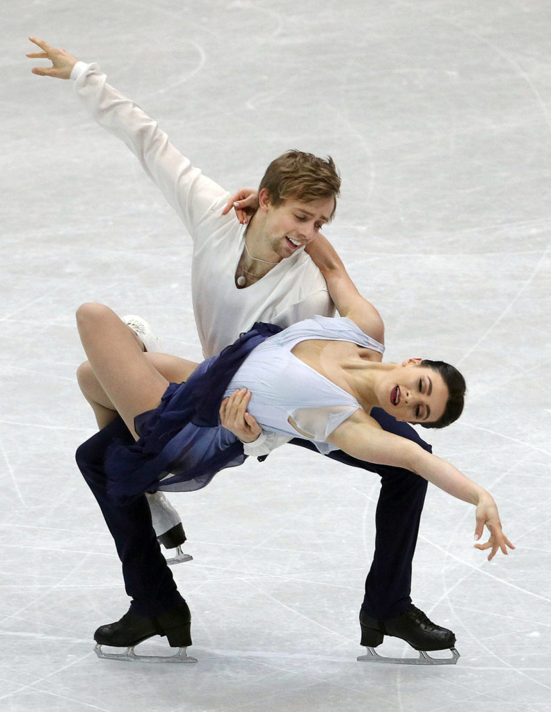 Jean-Luc Baker and Kaitlin Hawayek of the United States perform their free program in the ice dance event at the ISU Four Continents Figure Skating Championships on Thursday in Taipei, Taiwan. (AP Photo/Chiang Ying-ying)
