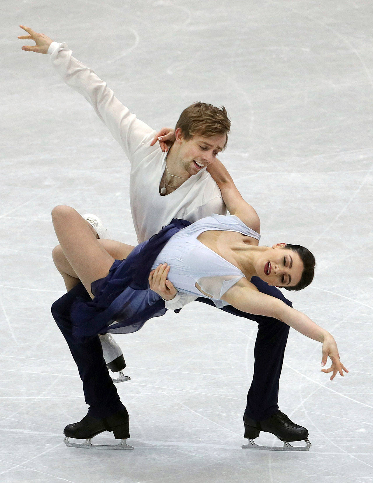 Jean-Luc Baker and Kaitlin Hawayek of the United States perform their free program in the ice dance event at the ISU Four Continents Figure Skating Championships on Thursday in Taipei, Taiwan. (AP Photo/Chiang Ying-ying)