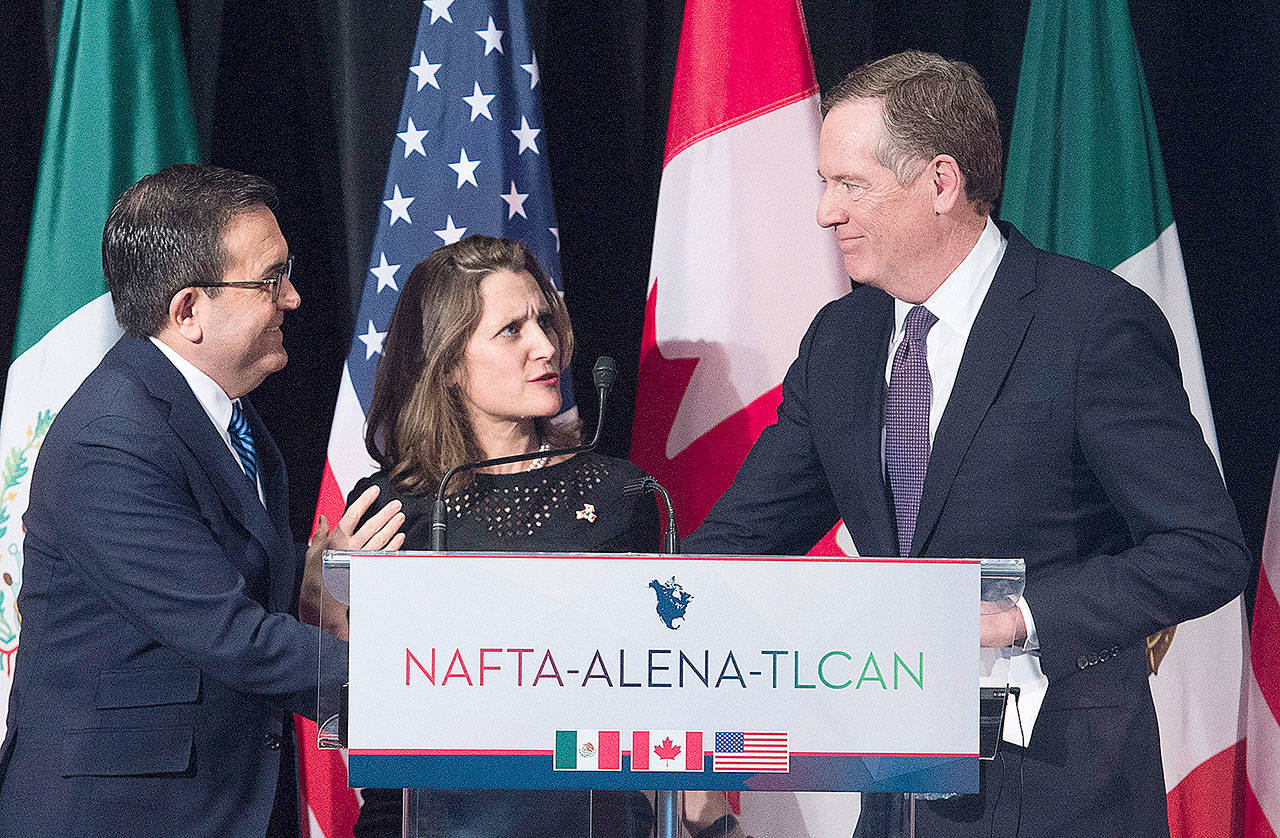 Canadian Foreign Affairs Minister Chrystia Freeland talks with U.S. Trade Representative Robert Lighthizer (right) and Mexico’s Secretary of Economy Ildefonso Guajardo Villarreal on Monday after a sixth round of negotiations for a new North American Free Trade Agreement in Montreal. (Graham Hughes/The Canadian Press)