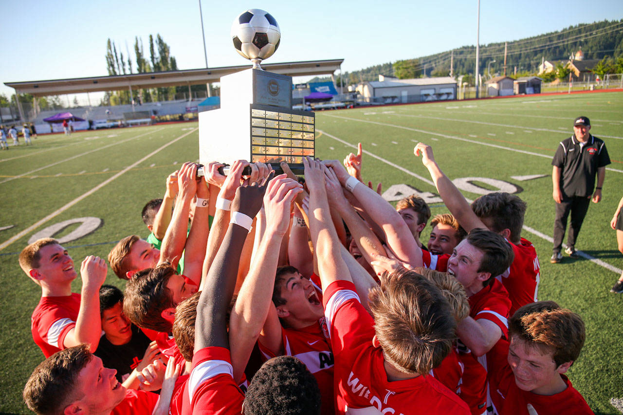 Archbishop Murphy celebrates their win for the 2A state soccer championship on May 27, 2017. Next school year, the Wildcats will compete against mostly 3A and 4A public schools as part of the Wesco high school sports league. (Kevin Clark / The Herald)