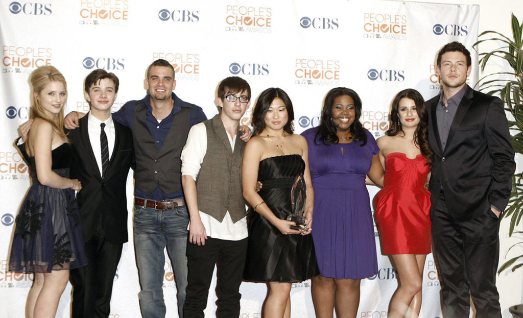 In this Jan. 2010 photo, the cast of “Glee” (from left), Dianna Agron, Chris Colfer, Mark Salling, Kevin McHale, Jenna Ushkowitz, Amber Riley, Lea Michele and Cory Monteith arrives at the People’s Choice Awards in Los Angeles. (AP Photo/Matt Sayles)
