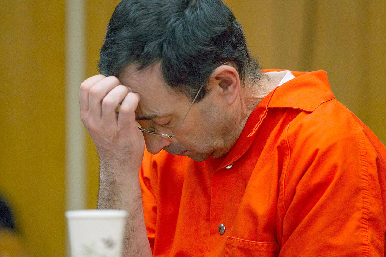 Larry Nassar appears for his sentencing at Eaton County Circuit Court in Charlotte on Wednesday. (Cory Morse / The Grand Rapids Press via AP)