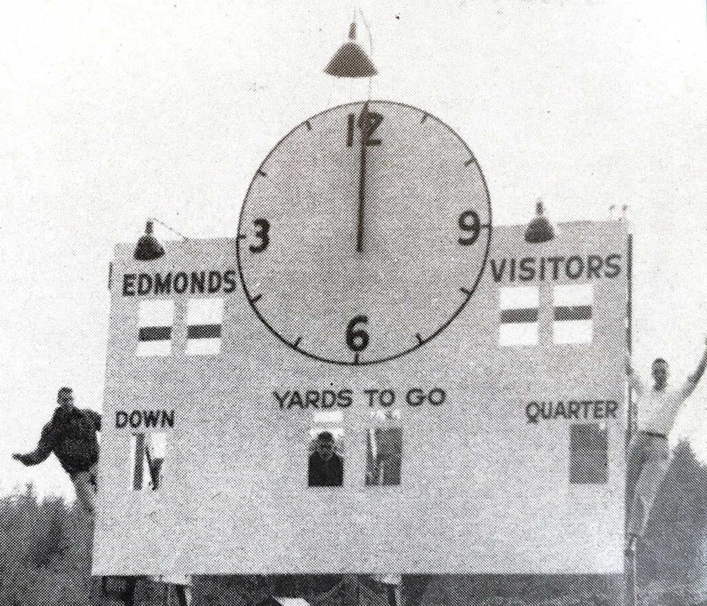 From left: Dale Burdett, Ron Wailes and Loel Symmes at the installation of a new scoreboard at Civic Stadium in 1952. (Edmonds Historical Museum)

