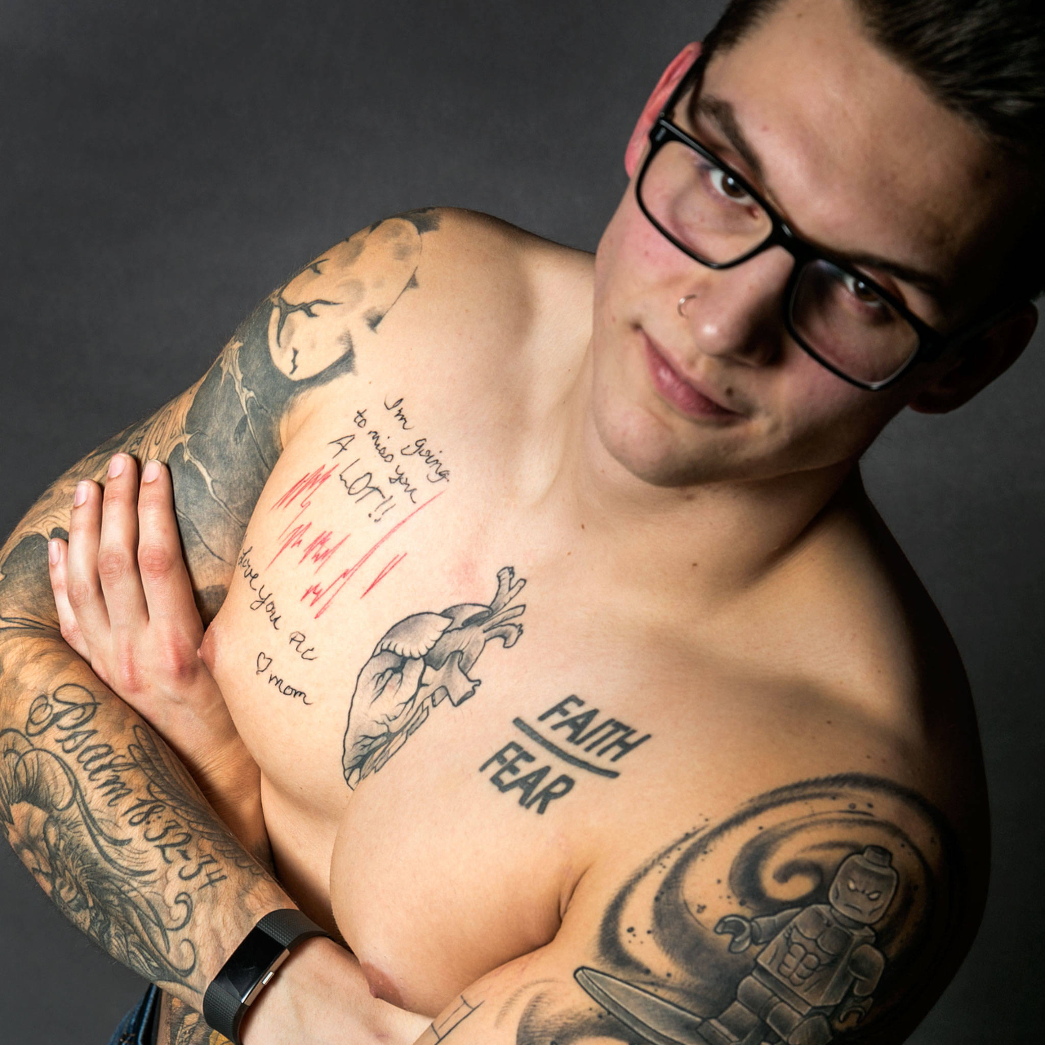 Thomas Resch, 21, of Marysville, has a tattoo on his chest of his mom’s last heartbeat. Deborah Resch, 50, died Jan. 16. (Kevin Clark / The Herald)