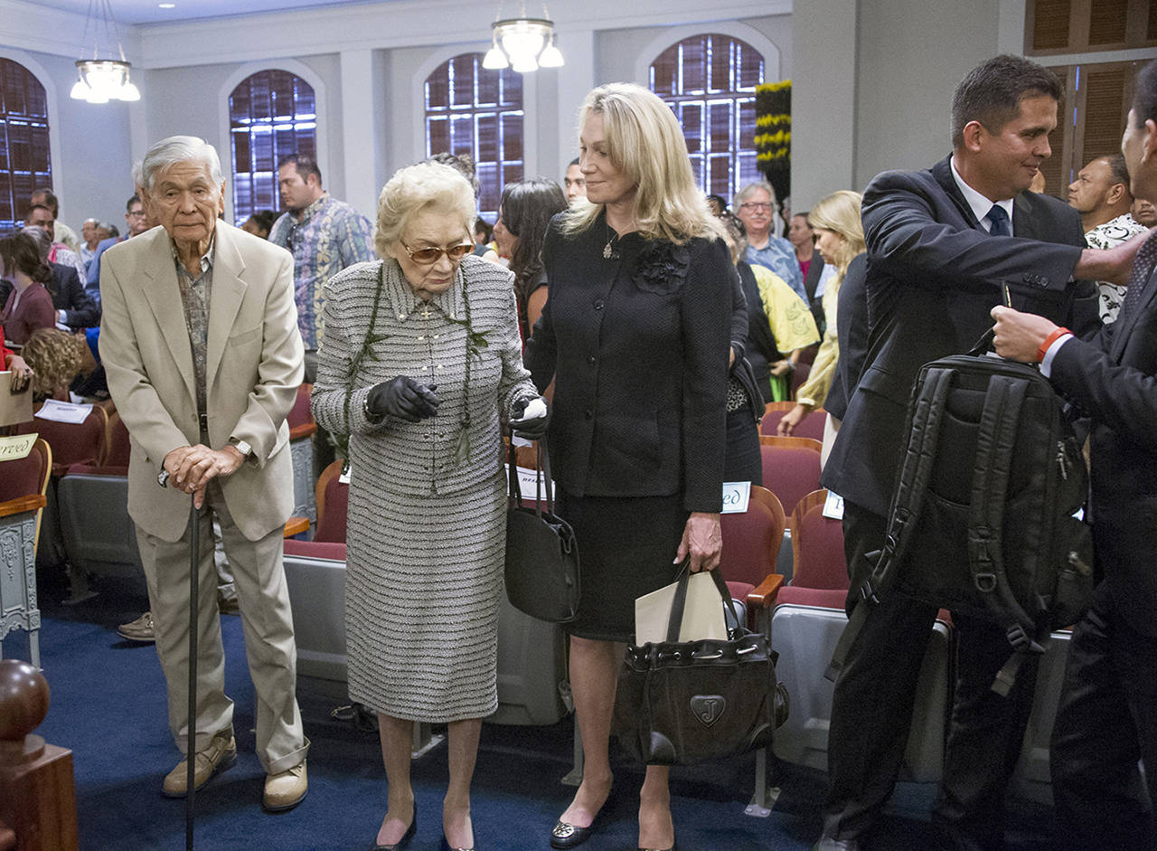 Former Hawaii Gov. George Ariyoshi (left) and and Princess Abigail Kawananakoa (center) arrive before oral arguments at the Hawaii State Supreme Court in Honolulu in Aug. 2015. Kawananakoa and Veronica Gail Worth (center right), her girlfriend of 20 years, were married during a ceremony on Oct. 1, 2017. (Craig T. Kojima/Honolulu Star-Advertiser via AP, Pool, File)