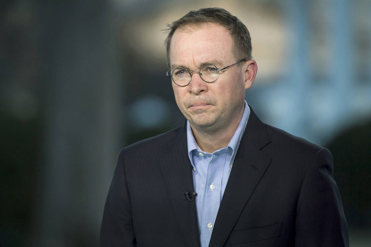 Director of the Office of Management and Budget Mick Mulvaney stands for a television interview at the White House in Washington on Jan. 20. (Jabin Botsford/Washington Post)