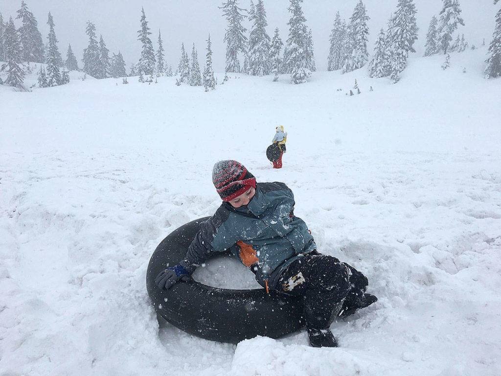 Charlie Swaney, 10, exits his inner tube after a sledding run during a recent visit to Mount Baker. (Aaron Swaney)
