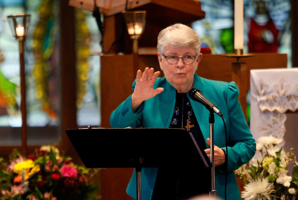 Sister Elisabeth Tiernan delivers the eulogy for Sister Barbara Geib Thursday at St. Mary of the Valley Catholic Church in Monroe. (Dan Bates / The Herald)
