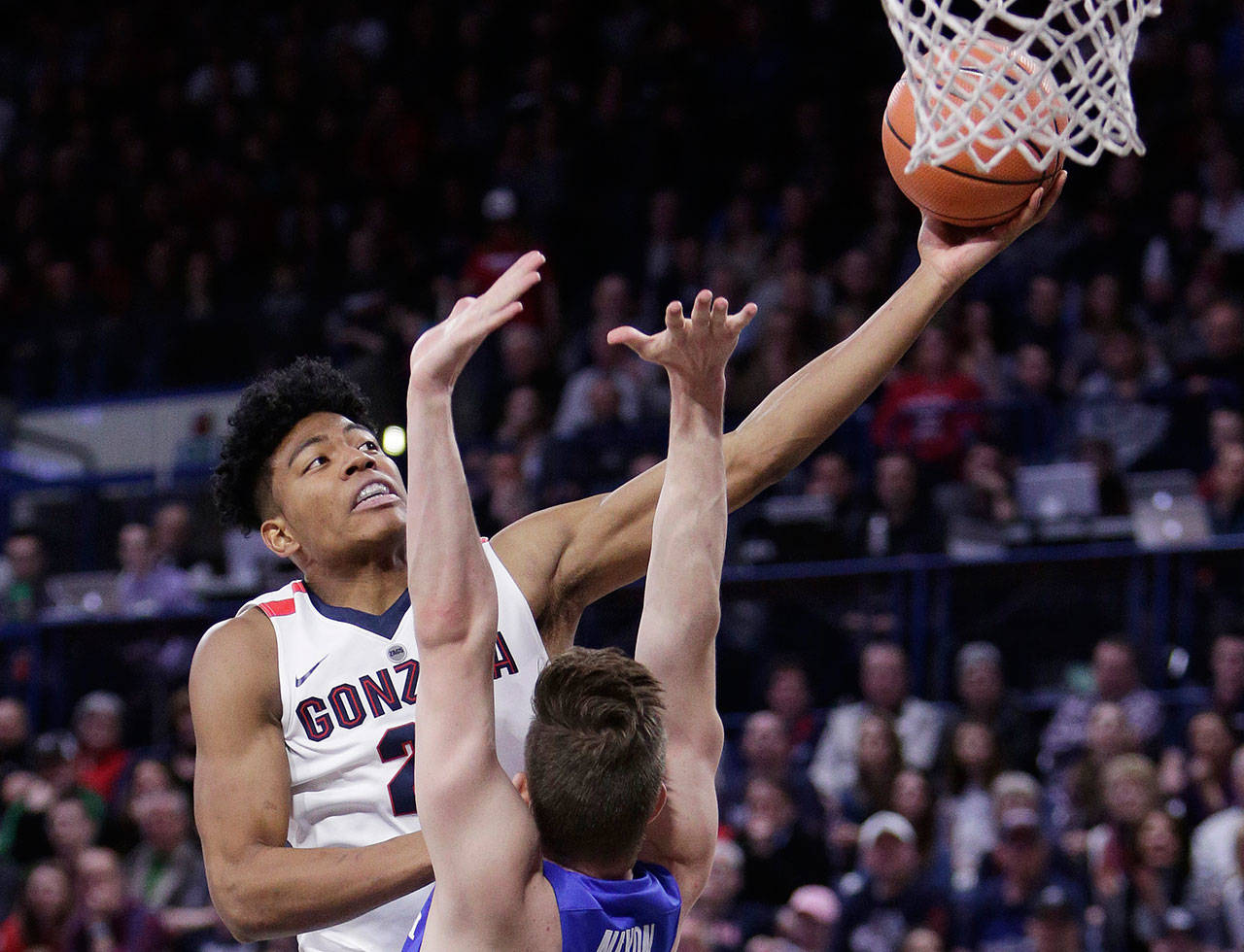 Gonzaga forward Rui Hachimura shoots over BYU’s Dalton Nixon during the first half of their game Saturday in Spokane. Hachimura led Gonzaga with 15 points. (AP Photo/Young Kwak)