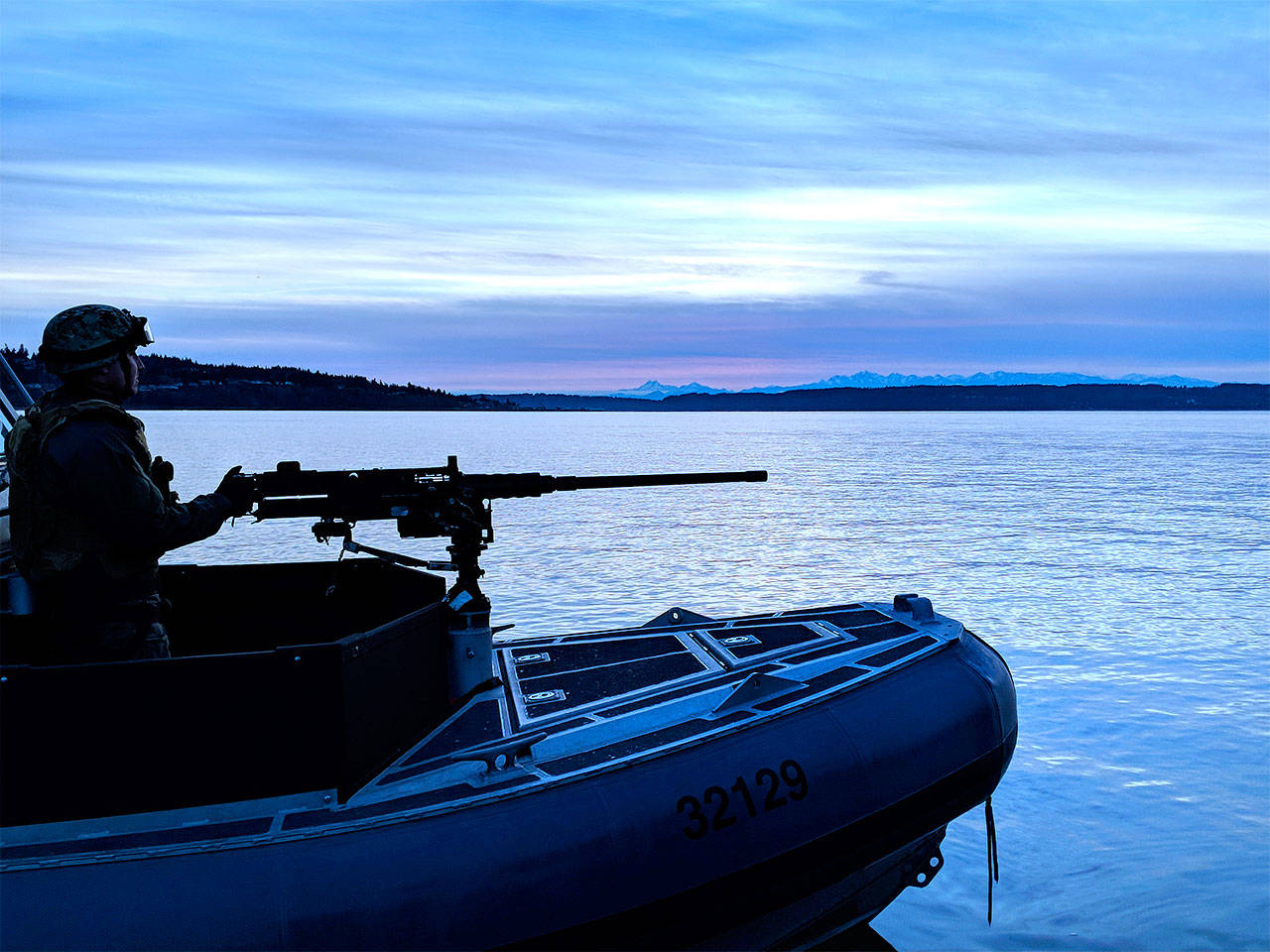 Petty Officer 2nd Class Kaare Anderson of U.S. Coast Guard Port Security Unit 313 in Everett participates in night tactic training on Feb. 11. (Petty Officer 1st Class Robert Kroll / U.S. Coast Guard)