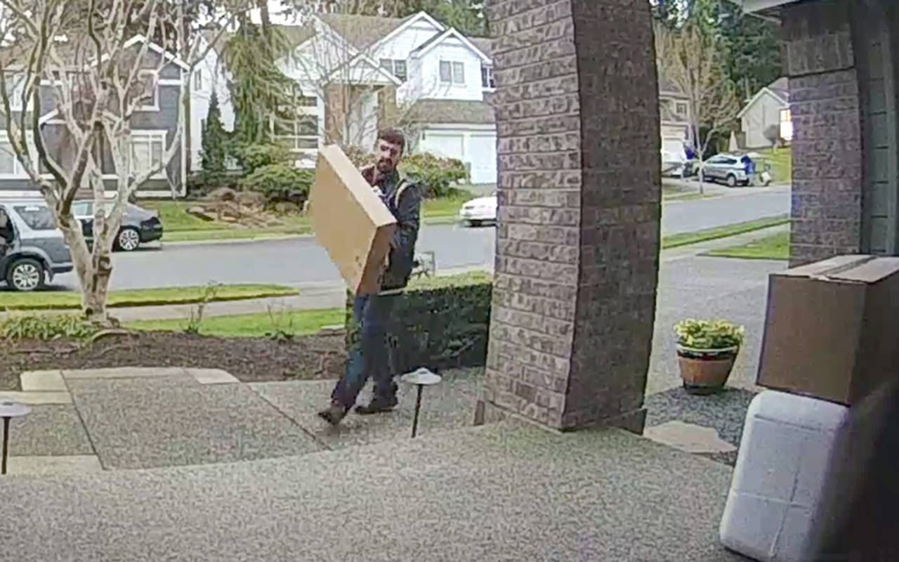 Mill Creek police seek the public’s help in identifying a man who stole two packages from the front porch of a Mill Creek residence. (City of Mill Creek)