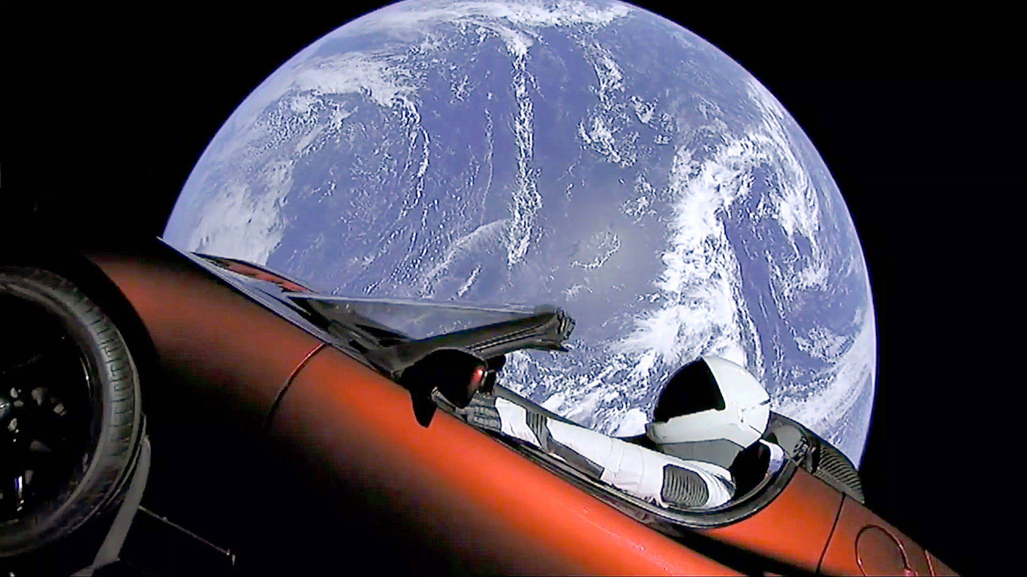 This image from SpaceX video shows the company’s spacesuit in Elon Musk’s Tesla sports car which was launched into space during the first test flight of the Falcon Heavy rocket Tuesday. (SpaceX)