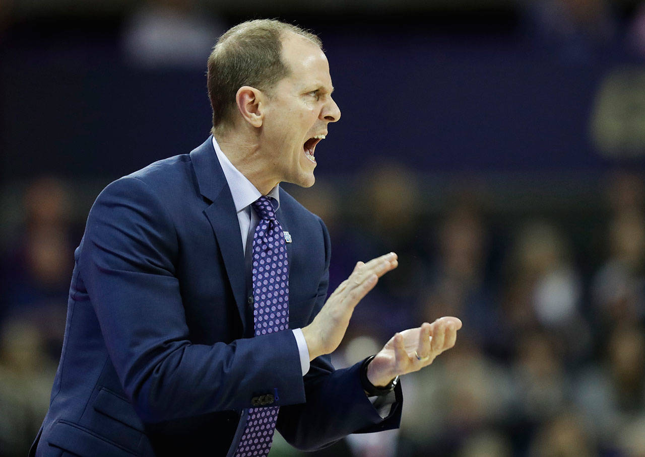 Washington head coach Mike Hopkins calls to his team during the first half of a game against Washington State on Jan. 28, 2018, in Seattle. (AP Photo/Ted S. Warren)