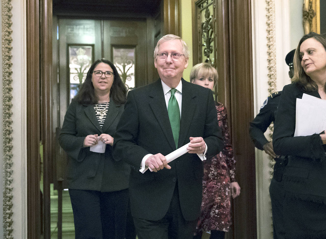 Senate Majority Leader Mitch McConnell, R-Ky., leaves the chamber after announcing an agreement in the Senate on a two-year, almost $400 billion budget deal that would provide Pentagon and domestic programs with huge spending increases, at the Capitol in Washington on Wednesday. (AP Photo/J. Scott Applewhite)