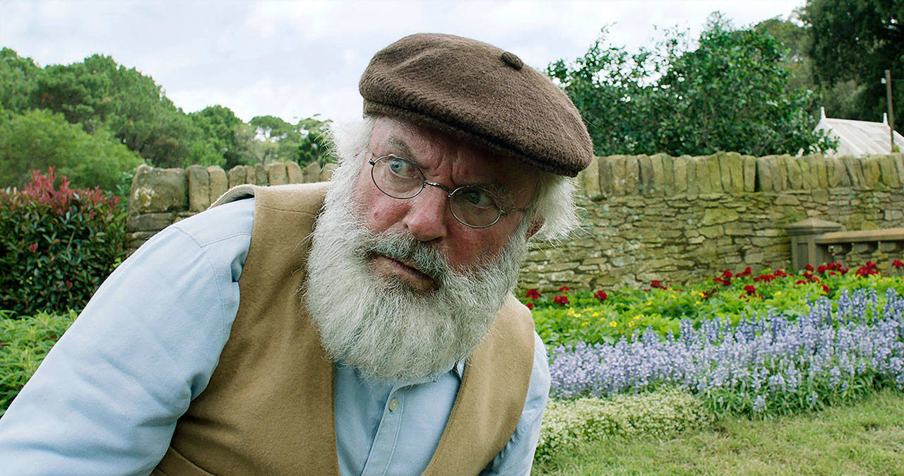 Sam Neill stars in a feature adaptation of Beatrix Potter’s classic tale of the rebellious “Peter Rabbit,” who tries to sneak into a farmer’s vegetable garden. (Columbia Pictures/Sony via AP)