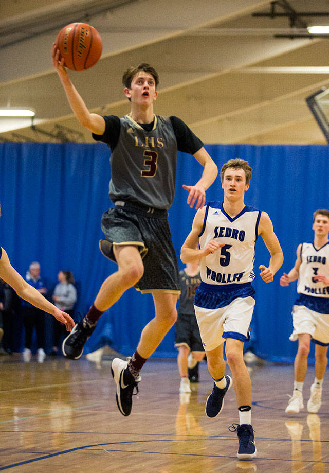 Lakewood’s CJ McClellan goes up for a layup during a game against Sedro-Woolley on Feb. 6, 2018, in Sedro-Woolley. (Andy Bronson / The Herald)