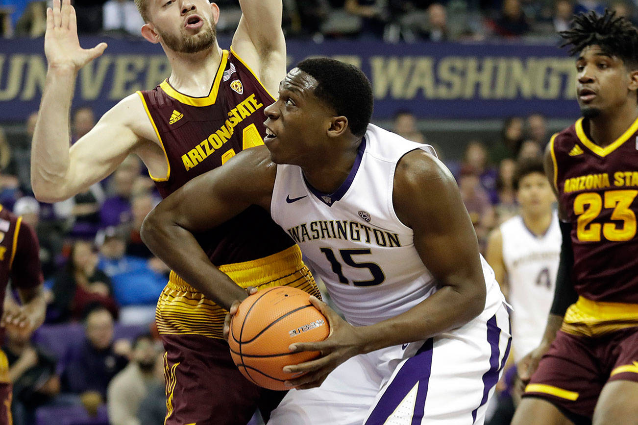 Art Thiel: Dickerson down low has Huskies climbing high