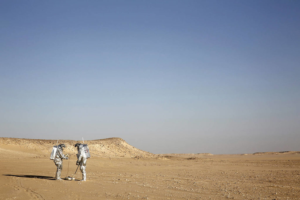 Two scientists test space suits and a geo-radar for use in a future Mars mission in the Dhofar desert of southern Oman. (AP Photo/Sam McNeil)
