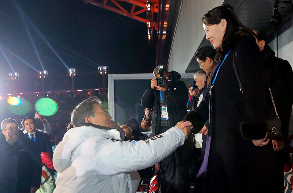 South Korean President Moon Jae-in (left) shakes hands with North Korean leader Kim Jong Un’s younger sister, Kim Yo Jong, during the opening ceremony of the 2018 Winter Olympics in Pyeongchang, South Korea, on Friday. (Kim Ju-sung/Yonhap via AP)
