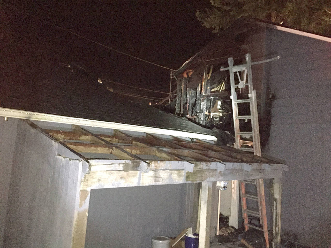 A fire left about $80,000 in damage to a vacant Lynnwood home early Saturday. (South Snohomish Fire and Rescue)