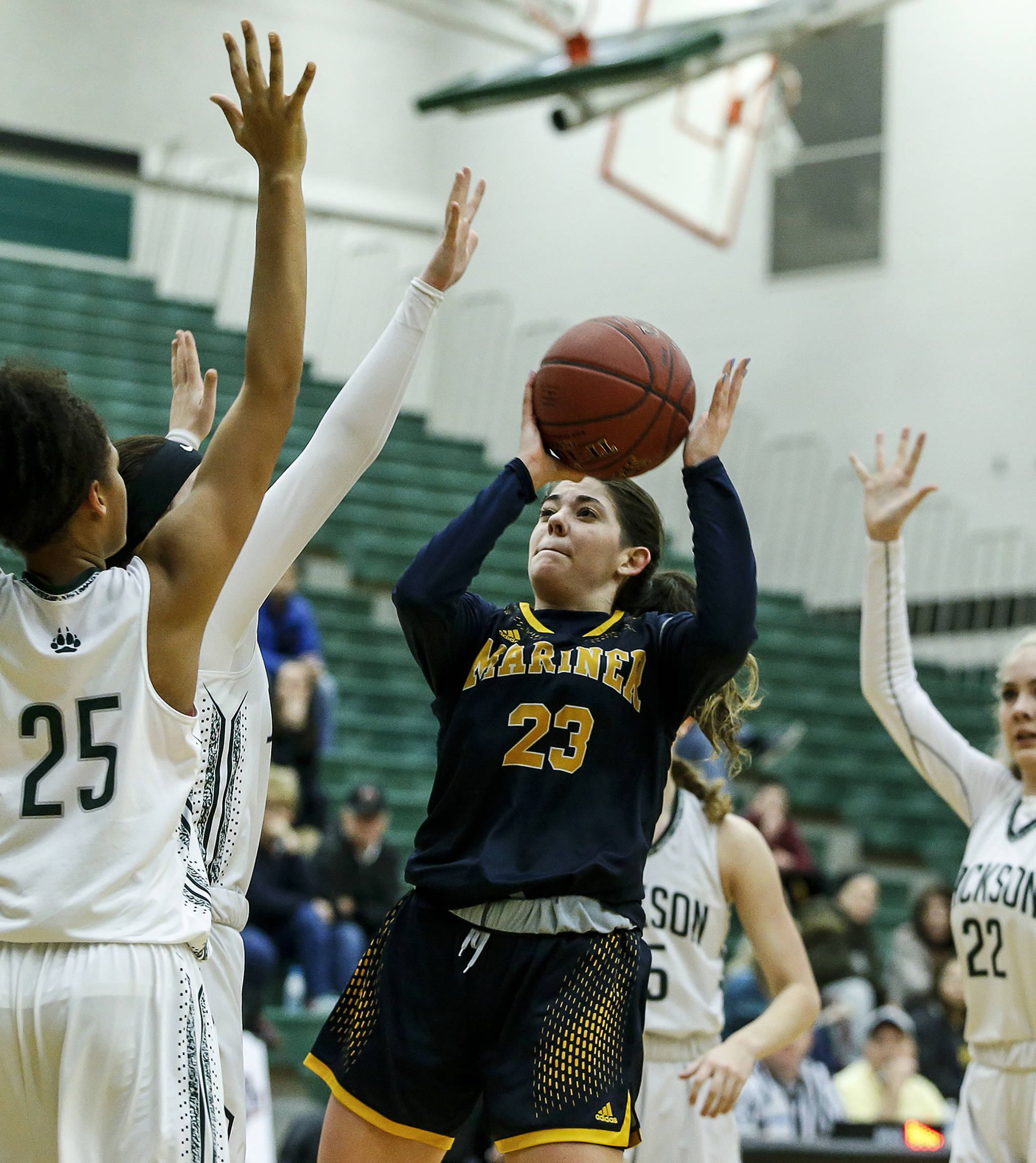 Mariner’s Hannah Hezekiah (23) takes a shot during a game against Jackson at Jackson High School in Mill Creek on Feb. 8. (Ian Terry / The Herald)