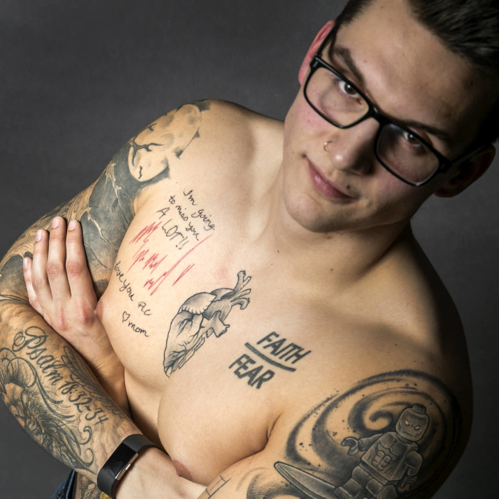 Thomas Resch, 21, of Marysville, has a tattoo on his chest of his mom’s last heartbeat. (Kevin Clark / The Daily Herald)
