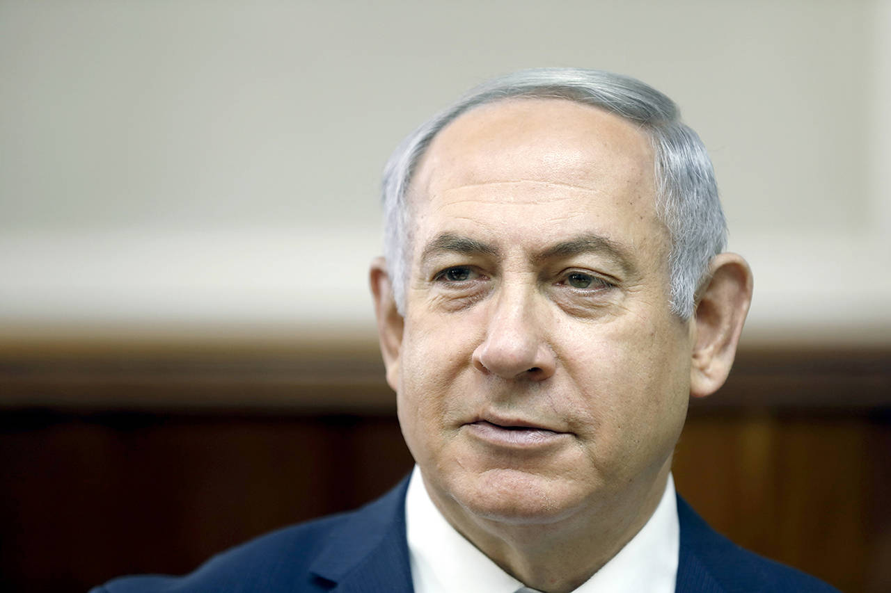 Israeli media reports say police are recommending a Netanyahu indictment on corruption charges, including bribery. (Ronen Zvulun, Pool via AP, File)