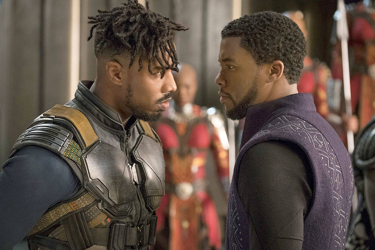 Killmonger (Michael B. Jordan, left) and T’Challa (Chadwick Boseman) face off in director Ryan Coogler’s “Black Panther.” (Disney/Marvel)